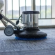 Side view of a floor scrubber
