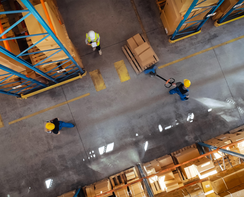 Top-Down View In Warehouse People Working